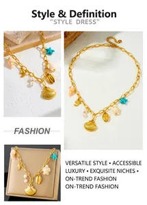 Detail showing gold beach charms including seashell, starfish, and turtle on link chain