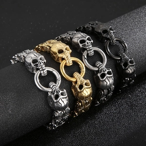 Gothic skull double layer chain bracelet in silver, gold, and black steel finishes