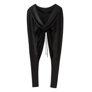 Detail of hooded top featuring a backless draped design and adjustable drawstrings