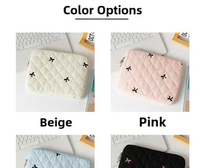 Quilted tablet sleeve with bow accents shown in beige, pink, blue, and black colors