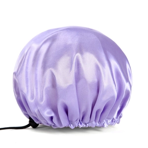 Macro view of lavender satin shower cap with waterproof PEVA lining and adjustable drawstring