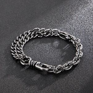 Detailed view of vintage industrial cuban chain bracelet in matte antique silver finish