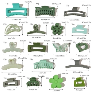Set of 17 green claw clips in various styles like flowers and geometric resin shapes