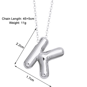 Detailed view of silver balloon initial K pendant with 45+5cm chain length and size specs