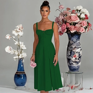 Detailed close-up of dark green French vintage sundress with lace-up corset waist design