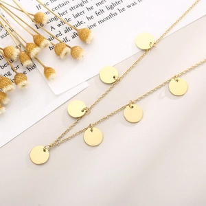 Minimalist gold stainless steel necklace with polished round disc pendants and fine chain