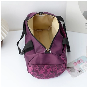 Top view of large purple nylon travel bag showing spacious interior with beige lining