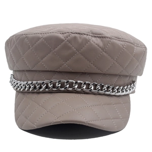 Quilted dark grey leather baker boy hat with chunky silver metal chain detail