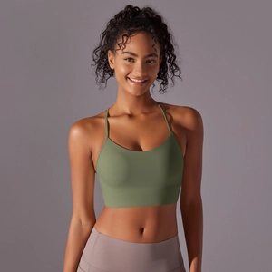 Close-up of olive green racerback sports bra with fine straps and brushed fabric texture