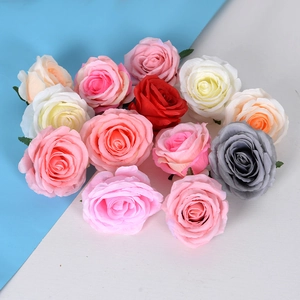 Artificial silk rose flower heads in multiple colors for wedding arch decor and DIY crafts