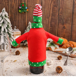 Close-up of a knitted snowman wine bottle sweater with a red and white striped mini hat