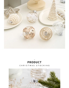 Detailed view of cream and champagne gold Christmas ornaments set with star and tree