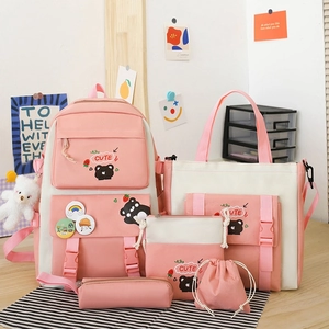 Detail view of 5-piece pink and white nylon school bag set with cute bear prints