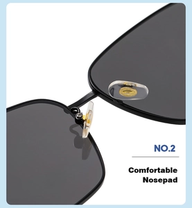 Macro detail of comfortable transparent nose pads with gold metal inserts on Y2K sunglasses