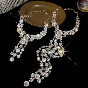 Elegant sparkling round rhinestone tassel pendant necklace with silver metal finish