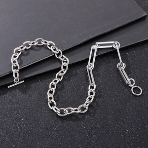 Detailed view of silver stainless steel mixed link chain bracelet with OT toggle clasp