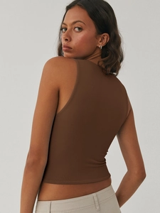 Detail view of the Y2K brown cropped tank top featuring a tight fit and racerback cut