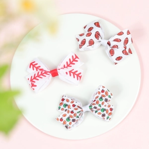 Set of three sports themed grosgrain hair bows featuring baseball and rugby patterns