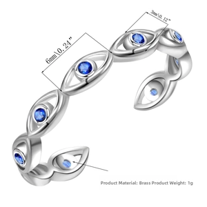 Close-up of silver Evil Eye open ring with blue gemstones and brass material details