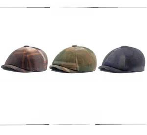 Détail de la texture en laine des bérets à carreaux vintage disponibles en plusieurs coloris