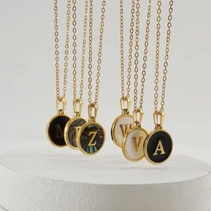 18K gold plated stainless steel initial necklace with natural shell and enamel pendants
