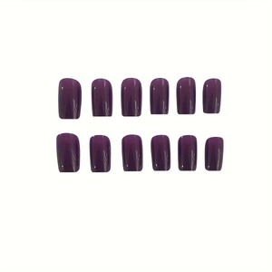 Glossy dark purple press-on nails in square-oval shape set on a white background
