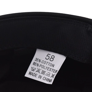Detail view of the inner care label showing 58 size and cotton polyester blend fabric