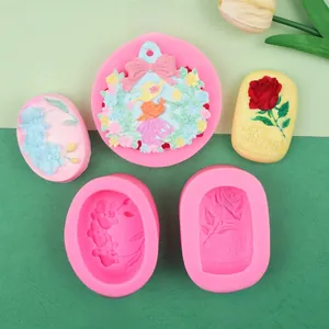 Macro shot of 3D orchid and rose relief silicone molds for floral scented soaps