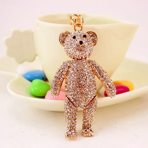 Sparkling crystal bear keychain in gold metal finish with rhinestone details