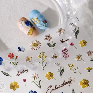 5D embossed nail stickers featuring intricate floral and insect embroidery patterns