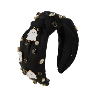 Détail du serre-tête d'Halloween à nœud avec breloques fantômes et strass brillants