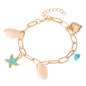 Bohemian gold chain bracelet with shell, starfish, and heart charms for beach vacations