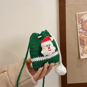 Handmade green crochet Christmas Santa drawstring crossbody bag for holiday gifts