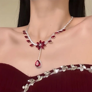 Elegant silver necklace with red flower pendant and pear-cut zircon for formal wear