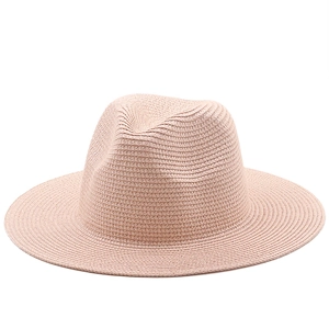 Top-down view of a classic pink woven fedora sun hat with fine straw texture detail