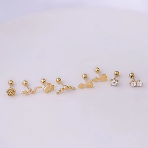 Golden stainless steel earring set featuring rose, snake and bee designs in a line