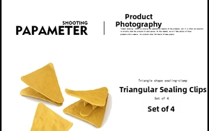 Macro detail of yellow triangle-shaped tortilla chip sealing clips in a set of four