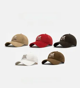 Close-up of soft cotton baseball caps featuring high-density 3D letter embroidery detail