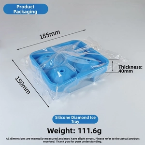 Blue silicone diamond-shaped ice cube mold in protective film with straw