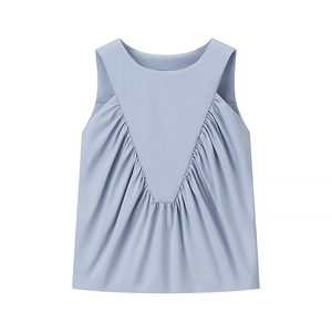 Detail of light blue sleeveless top with elegant V-shaped pleats and round neckline