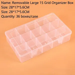Detail of 15-compartment transparent storage box with removable dividers and 28x17cm size