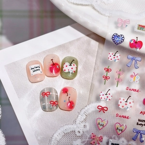 Sweet fruit and bow nail art stickers featuring cherry designs on white lace background