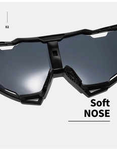 Detailed close-up of soft rubber nose pads on professional black cycling sunglasses