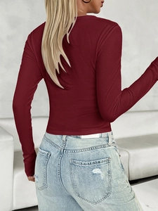 Back view of slim fit burgundy long sleeve top with ribbed texture and Y2K style