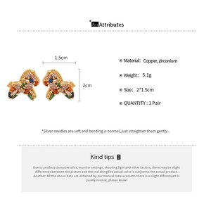 Detail view of horse stud earrings with zircon inlay specifications and measurements