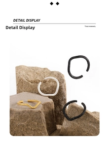 Detailed view of S925 sterling silver irregular rings in gold, silver and black finishes