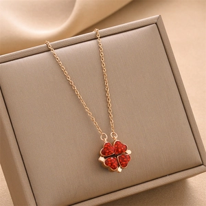 Convertible 18K gold titanium necklace with magnetic red clover and heart pendant