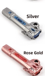 Detail view of silver and rose gold cosmic transformation device toy with metallic finish