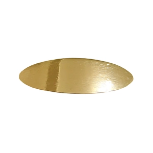Macro detail of golden metal oval hair clip showing brushed texture and metallic luster