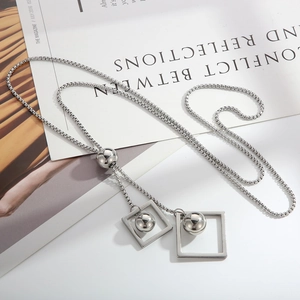 Elegant silver long chain necklace with geometric rhombic pendant and metallic beads